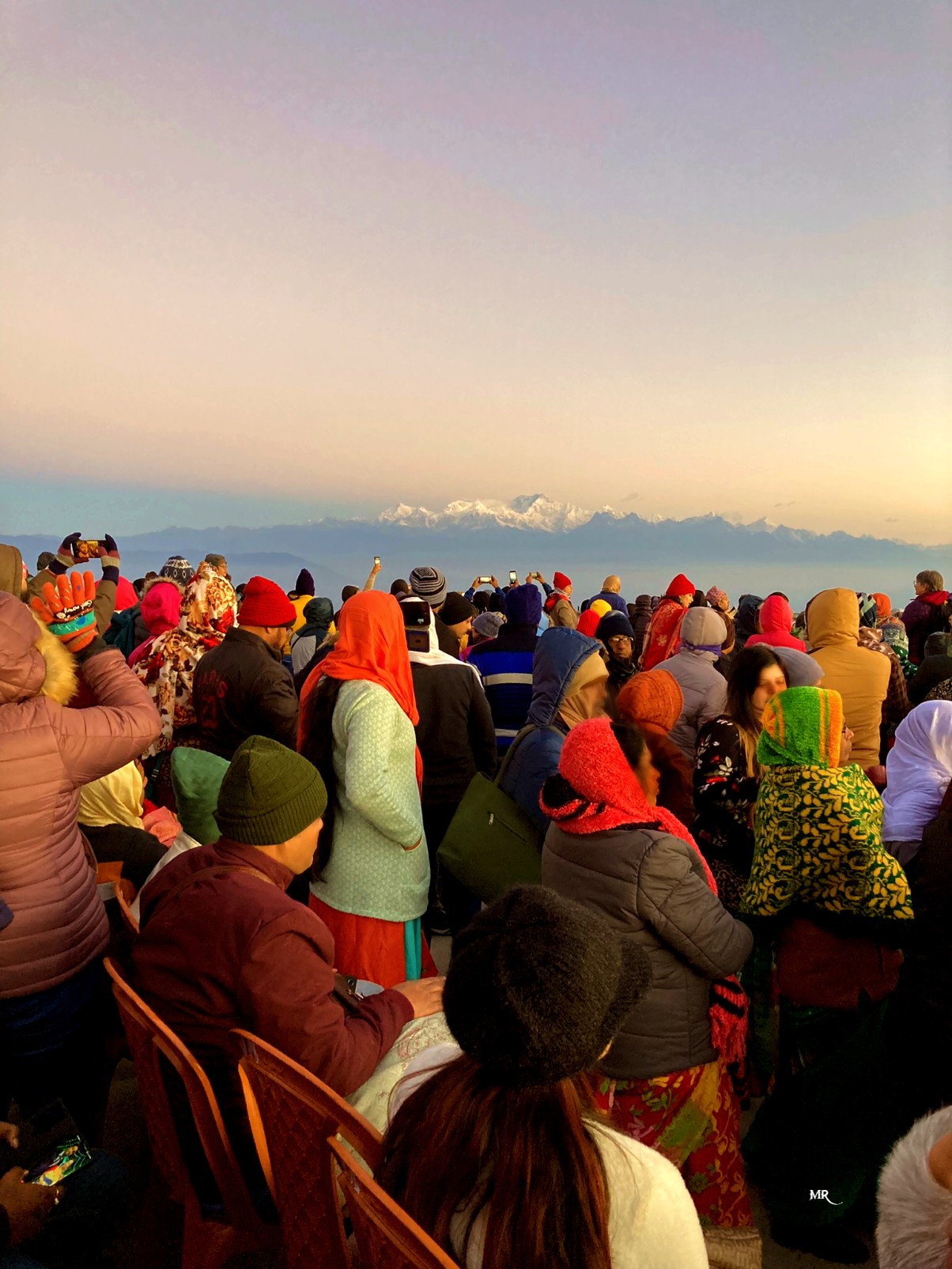 All I could capture on my iPhone were people taking pictures of the sunrise, or worse, watching it through someone else’s lens.